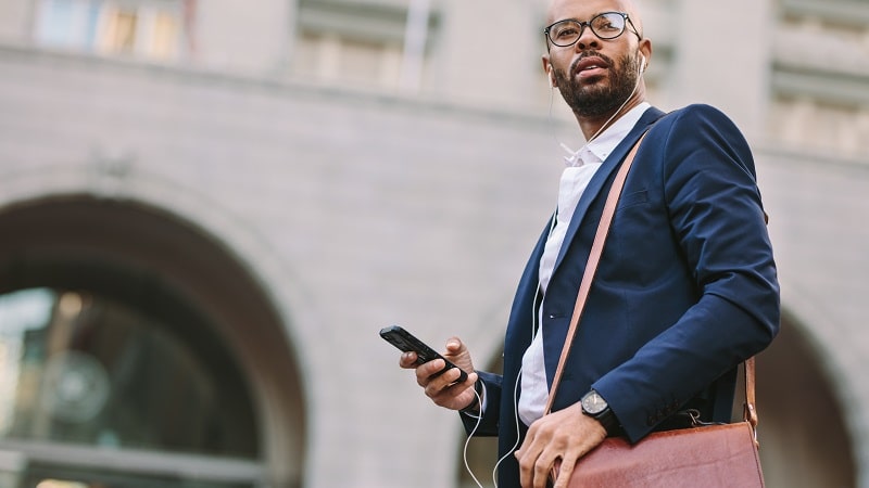 a determined looking man with his phone